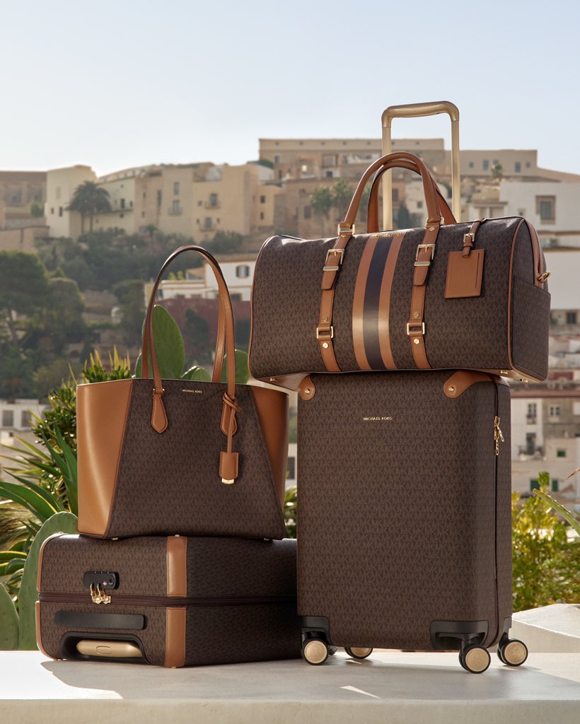 Our type of baggage.

michaelkors.com/travel/