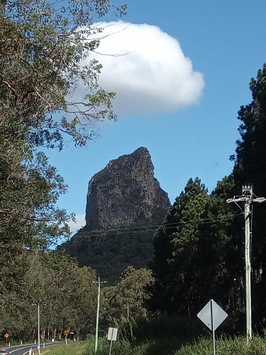 One of the Beautiful Glasshouse Mountains…..Mountains….im convinced they were once GIANT TREES. they seriously look out of place.