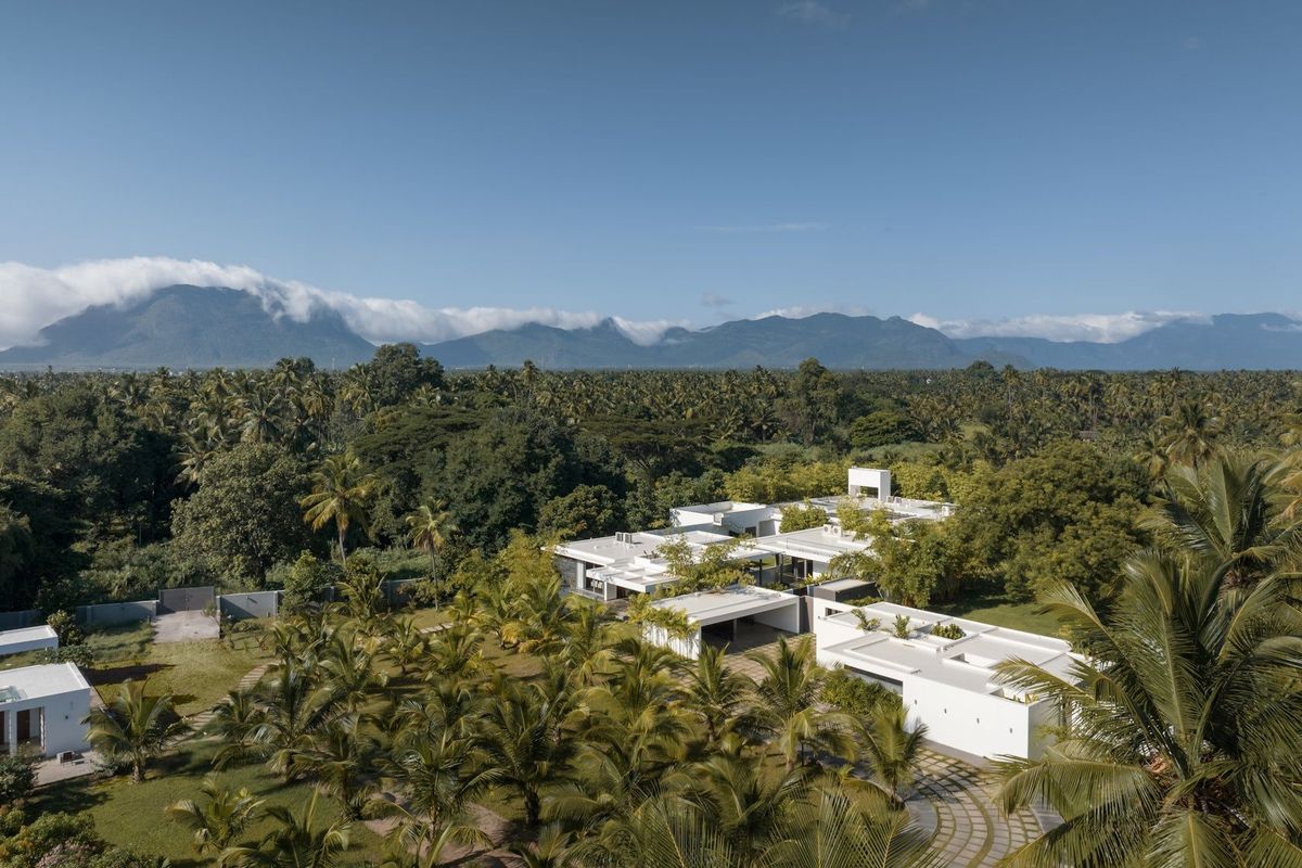 Architizer's tweet image. A series of simple geometric volumes creates framed outdoor zones, letting light and greenery move through the structure.

📍Coimbatore, India

Design: Icon Design Studio
Photography: Studio Recall/Ekansh Goel 
Details: arc.ht/4kIaUaq