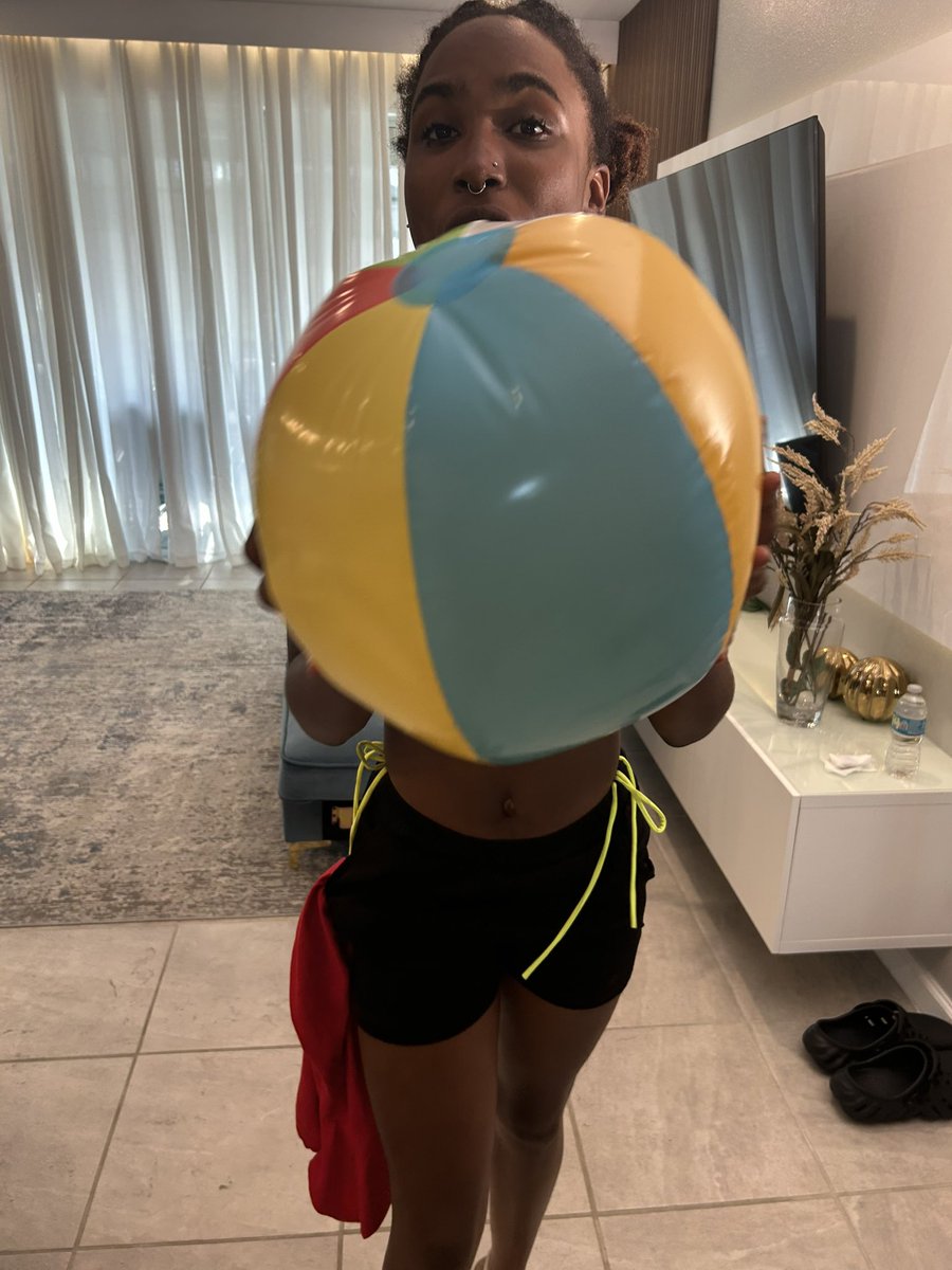 pinkglory33's tweet photo. Playing with a beach ball hoping to deflate them soon with my size 11 feet 🥰 https://t.co/4eRYkdkD6N