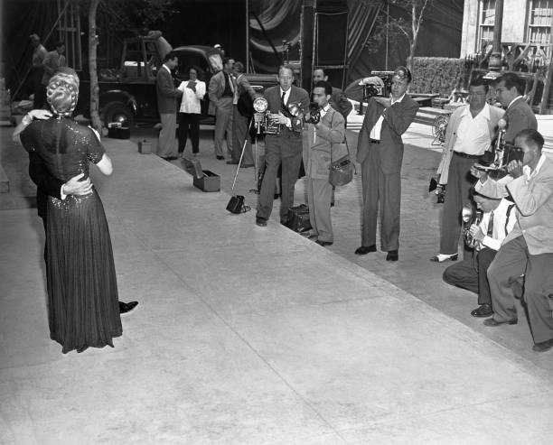 goldenagefilm's tweet photo. A couple of great #BTS/publicity photos from Fred Astaire &amp; Ginger Rogers' classic 1949 musical, The Barkley’s Of Broadway. The last film they did together and the only one of their series to be done in color. https://t.co/0bnM2wQuSa