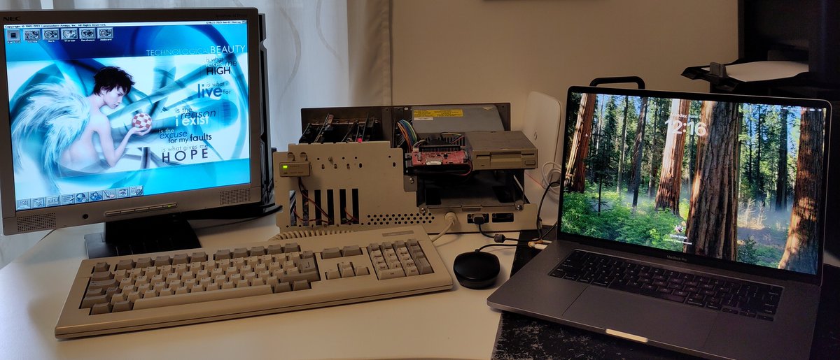 chainq's tweet image. The moment when during The Standup with @ThePrimeagen, @cmuratori pulls up an Amiga 2000 keyboard that just "happens to be" on his desk, because it's so amazing. Yes. YES. Thank you. 🥹

(Below is my desk, as illustration. Yes, I'm also a McIntosh user, running McOS. 😅)