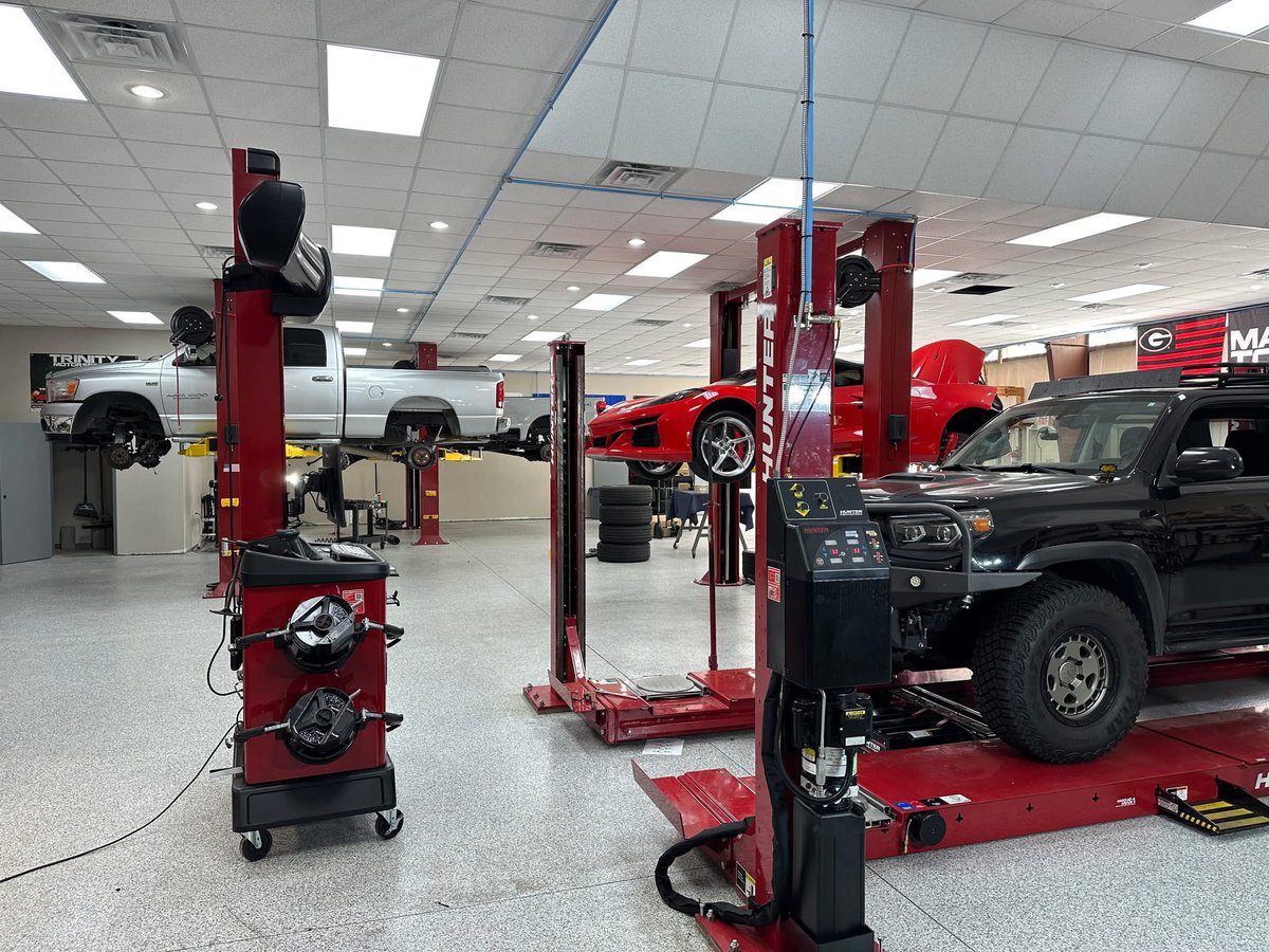 TrinityMoto's tweet photo. Our new shop expansion is 100% operational and stunningly beautiful. First-class epoxied floor, state-of-the-art Hunter Engineering wheel &amp; tire and alignment equipment, and our technician's favorite part...air conditioning! Here is a sneak-peek. Thanks to our amazing customers! https://t.co/Q655qQgeAC