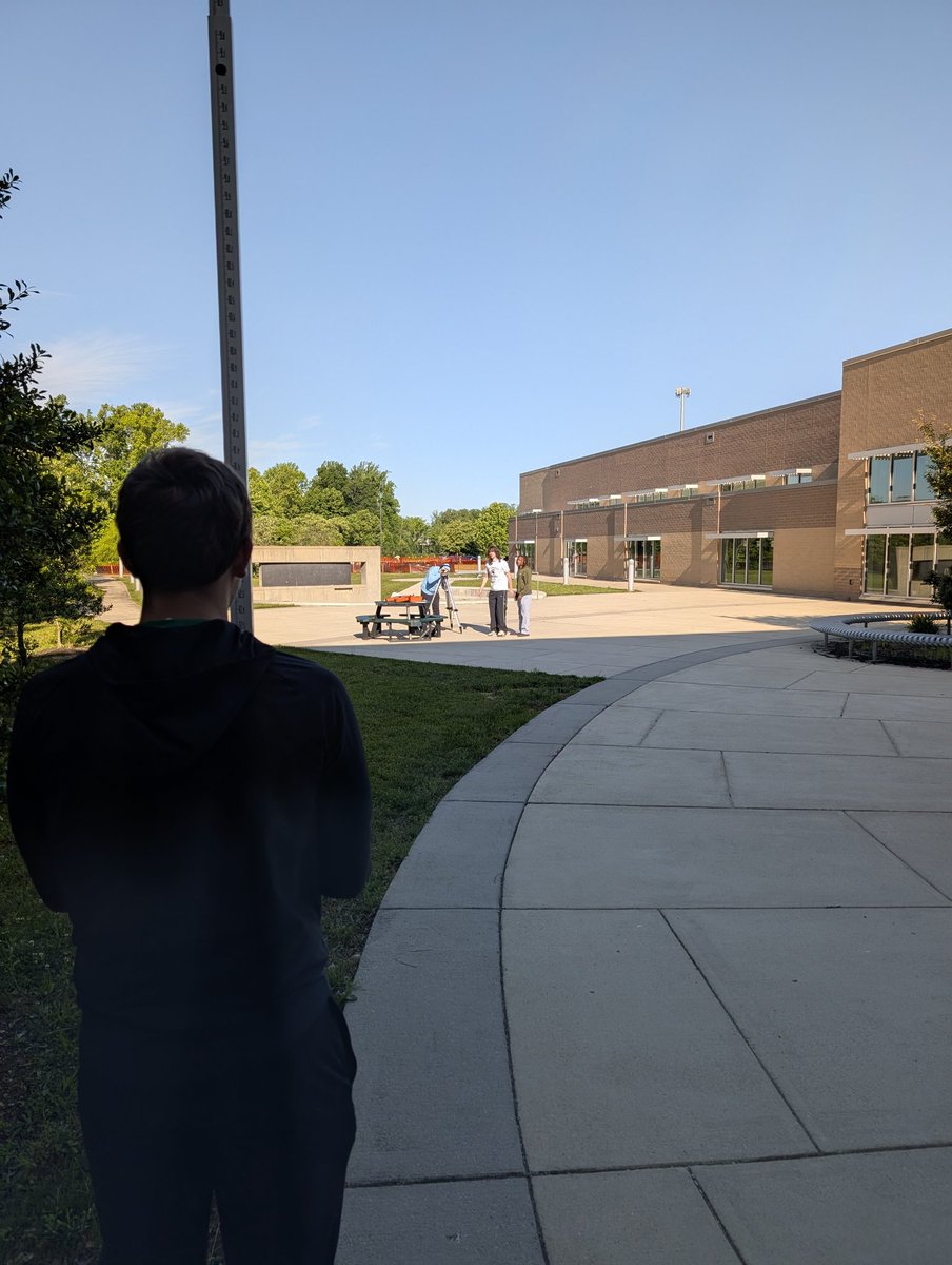 A morning with no rain?!?! Civil Engineering students are finally able to survey the school grounds.