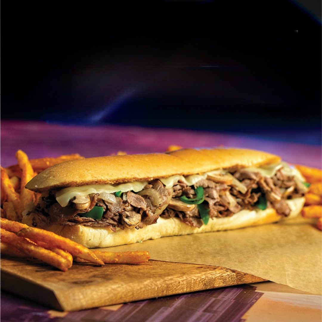 Our Philly Cheesesteak is the real deal 🧀🔥 One bite and you’re hooked. Only at Miami Grill. #PhillyDoneRight #MiamiGrillFlavor #CheesesteakCravings