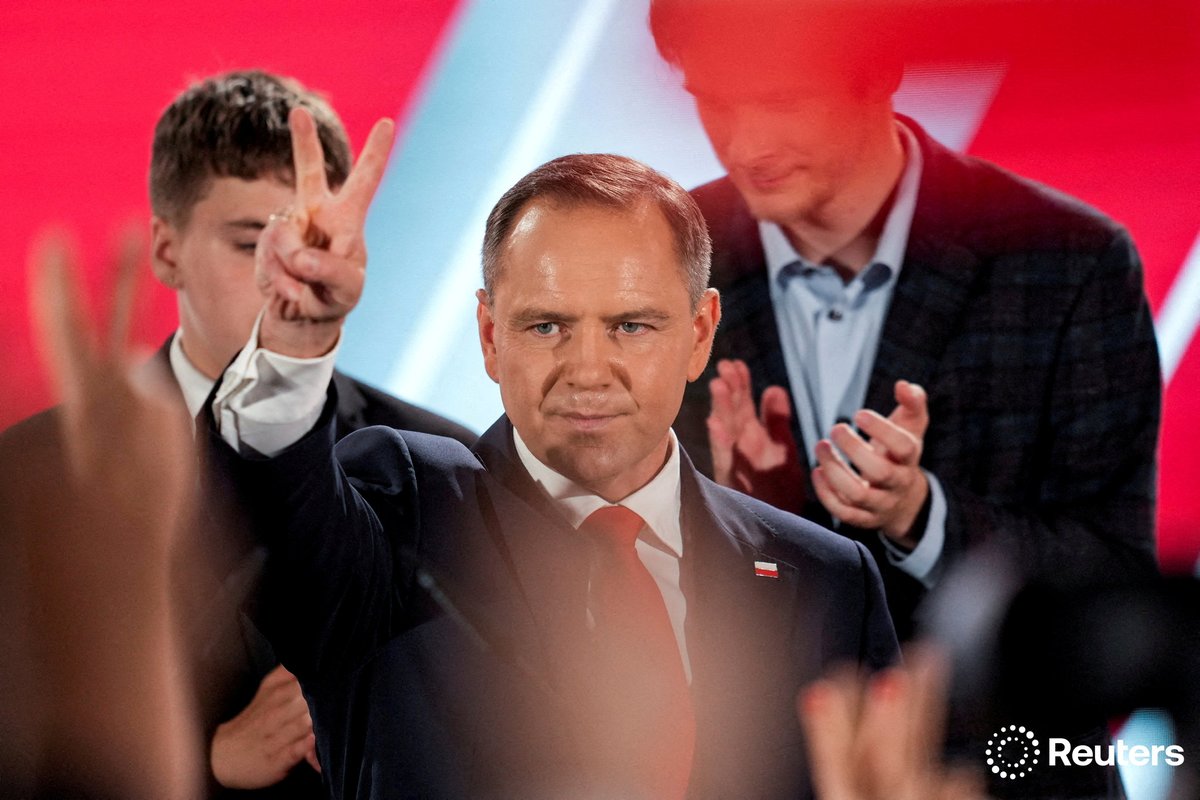 Polish nationalist candidate Karol Nawrocki, backed by the main opposition Law and Justice (PiS) party, reacts to the exit polls of the second round of the presidential election, in Warsaw, Poland reut.rs/3HkI6q9 📷 Aleksandra Szmigiel