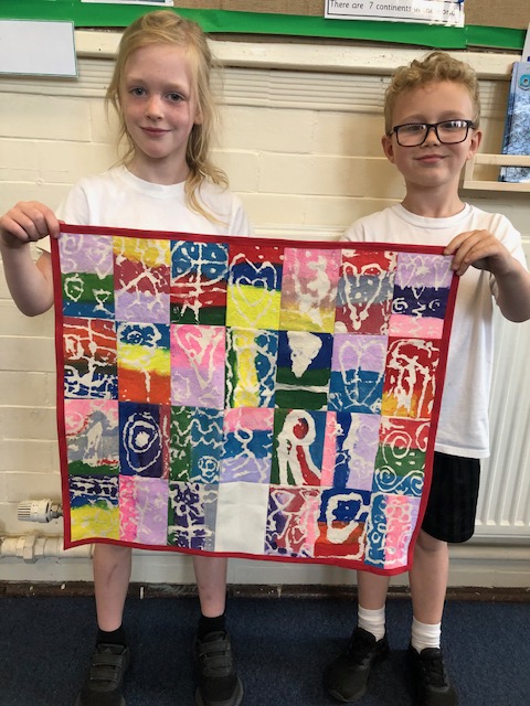 Grasshopper class are thrilled with their Batik work which has  now been expertly sewn together by Mrs Conway. We are artists!
