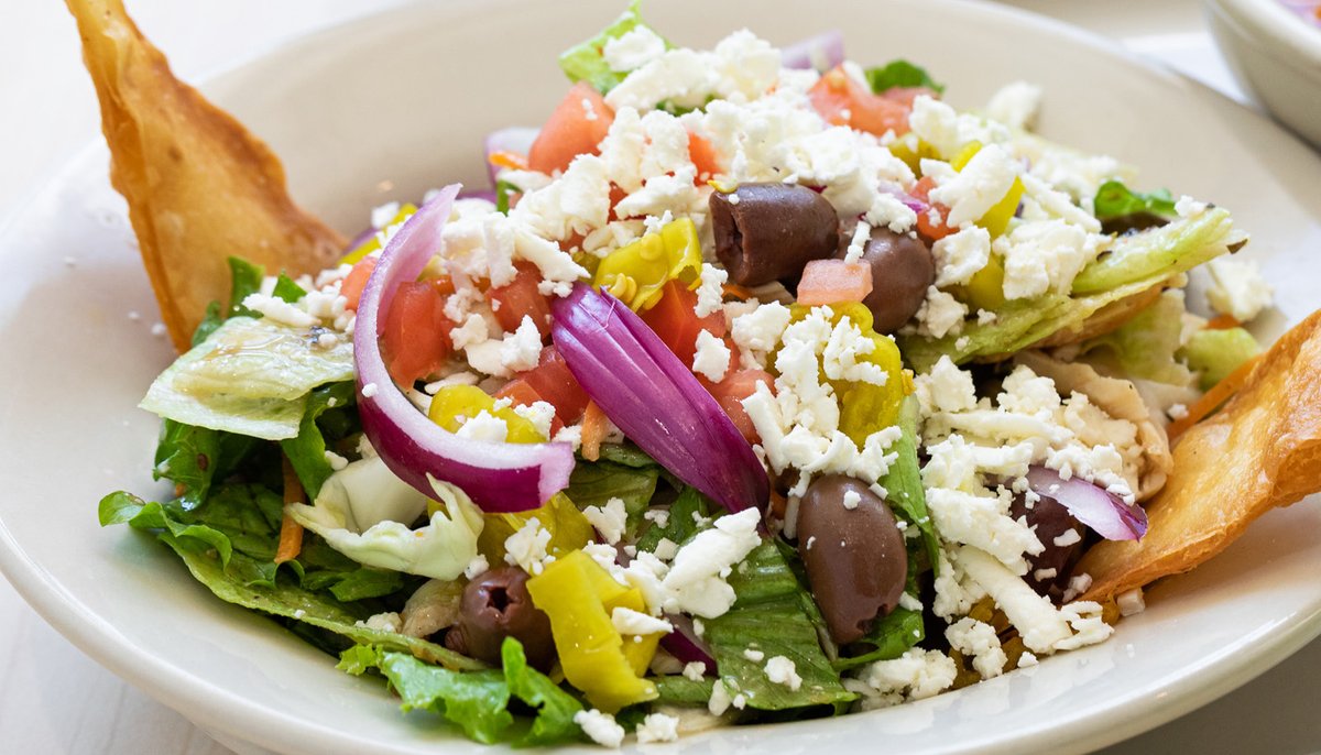 Don't skip lunch.
Our Greek Salad delivers the flavor
with perfectly topped greens, grilled chicken, feta, tomatoes, kalamata olives, pepperoncini peppers and red onions. Tossed with house-made Greek dressing. 
.
.
.
#TheToastedYolk #LunchMenu #BrunchLife