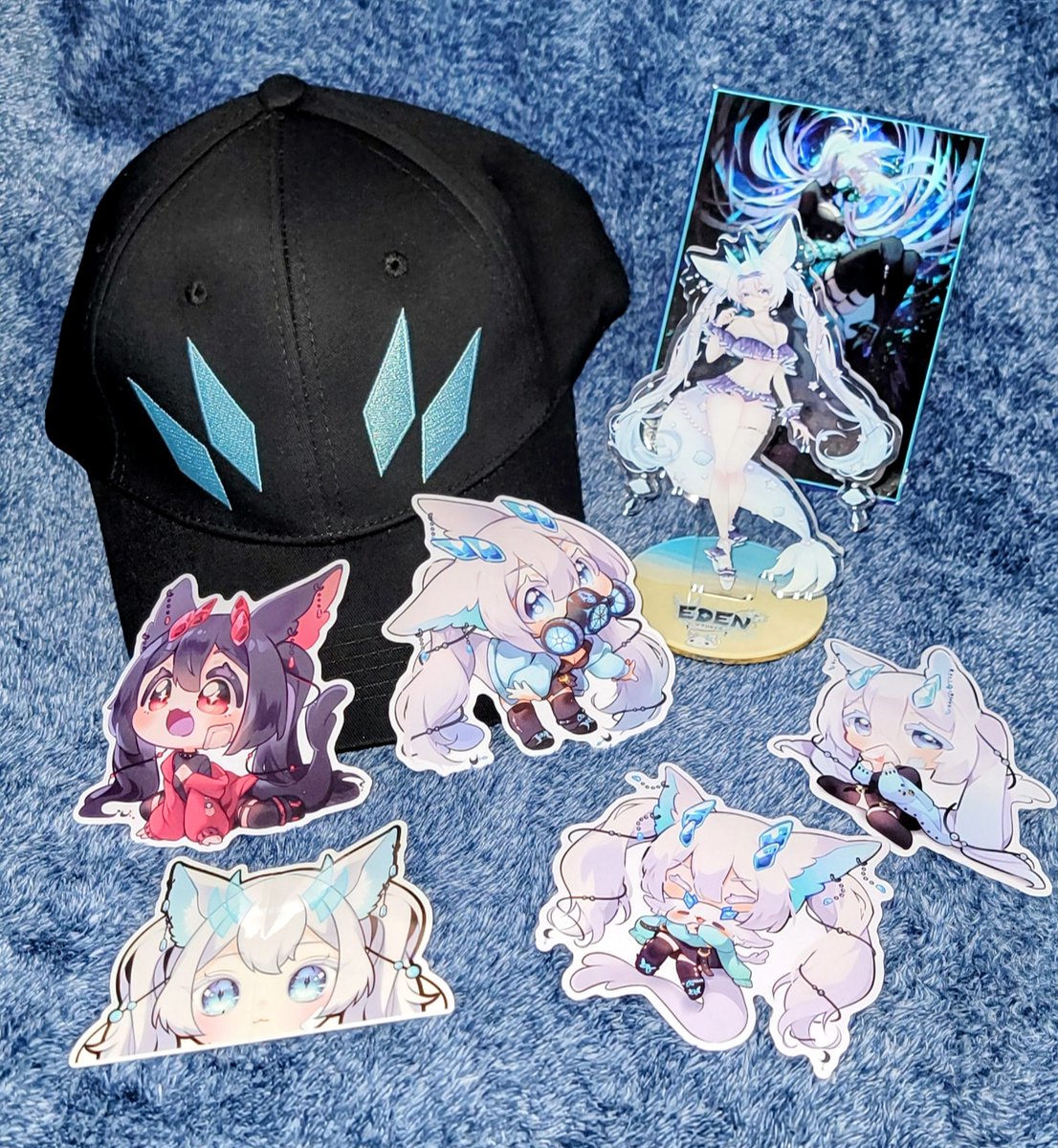 The <a href="/EdenVtuber/">Eden 💎 Vtuber</a> merch arrived today

Love the hat, it's comfy and really well made. The stickers are absolutely adorable and <a href="/KitsuneCorners/">KitsuneCorners</a> was ever so kind and included a bonus Edenpeek. The stickers are going on my PC case, with the peek on the front

Thank you 💙

 #edenmerch