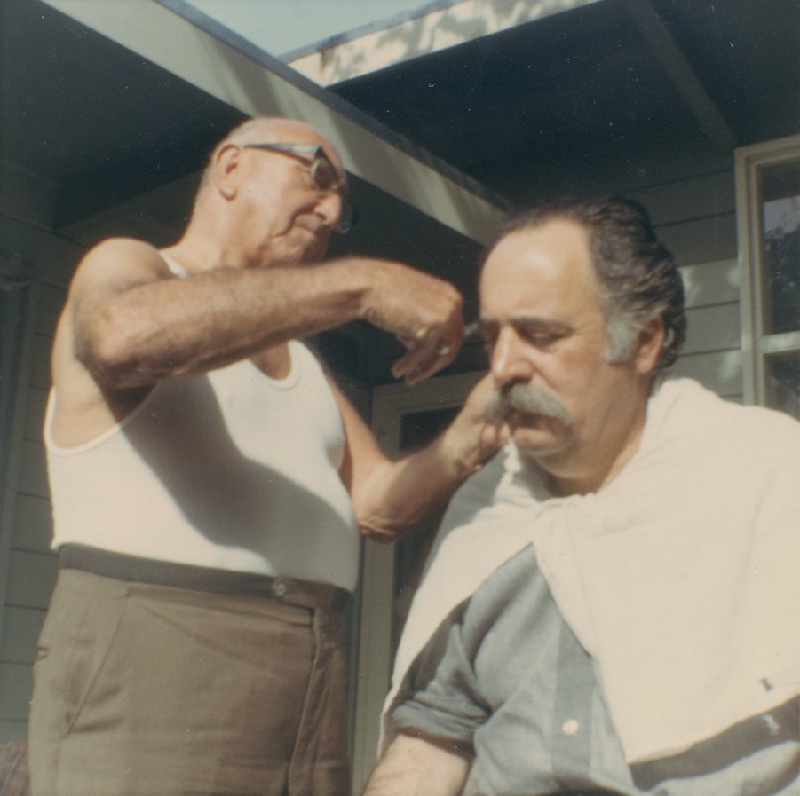 William Saroyan getting his hair cut by his uncle Aram Saroyan.