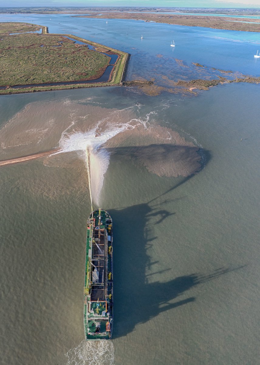 An evening delivery of sand and gravel for a beneficial use of dredging's project in Essex.