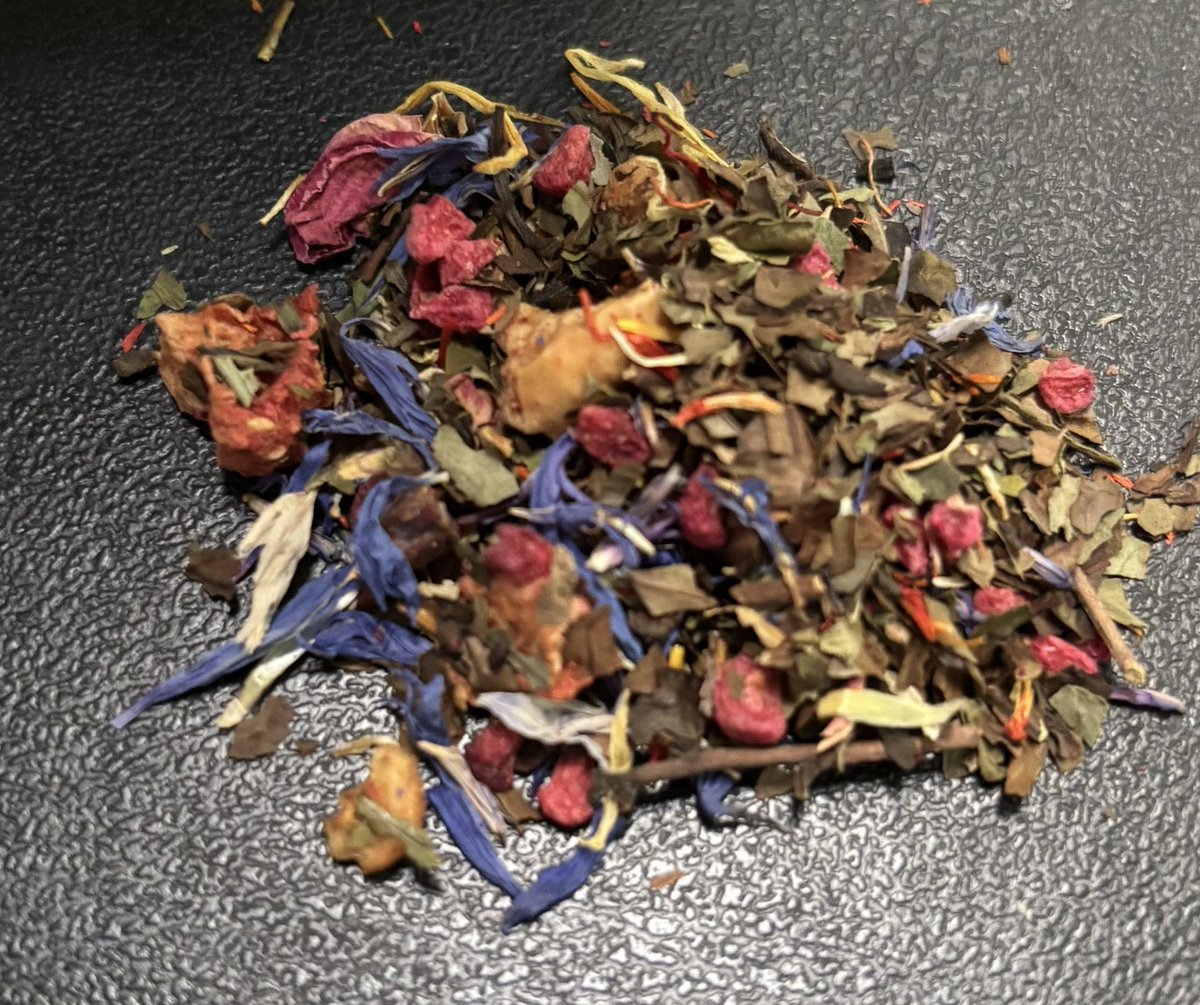 This tea is absolutely beautiful! And it can in fact turn colors from blue to purple!

A beautiful white tea!

Freshly and home done dehydration!
Farm picked fruits!

Apple, white tea, raspberry bits, strawberries, cornflowers, rose petals, safflowers, marigolds, blue petals