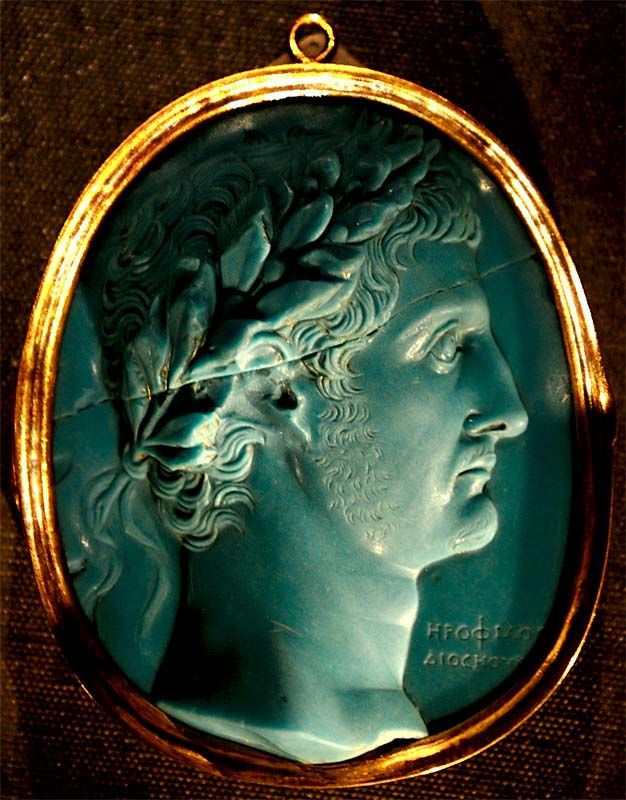 Roman glass cameo of either Drusus the elder or his son Germanicus, signed by the artist Herophilos, son of Dioskurides.

Γερμανικὸς ἄστρων,
οὐκ ἐμός· οὐ χωρεῖ νῆα τόσην Ἀχέρων
-
Germanicus belongs to the stars,
not to me; Acheron has no room for so great a ship
GA 7
