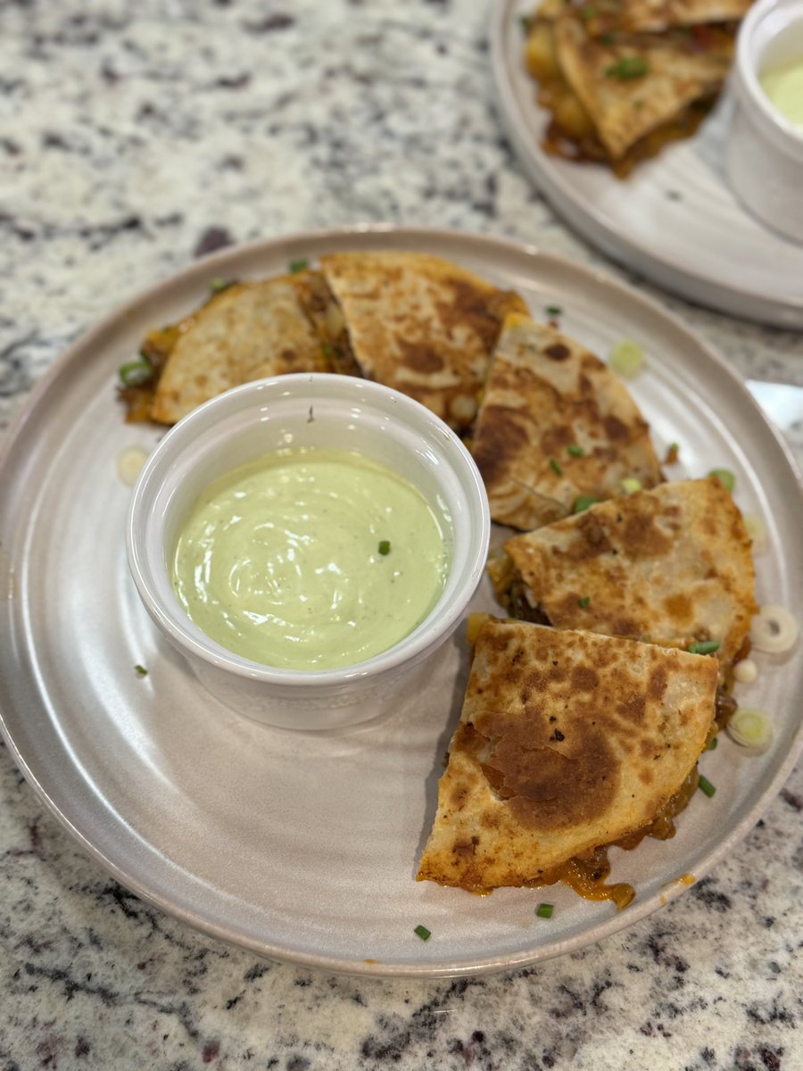 Fun night cooking with my boy!  Avocado jalapeño cream sauce and picadillo quesadillas!