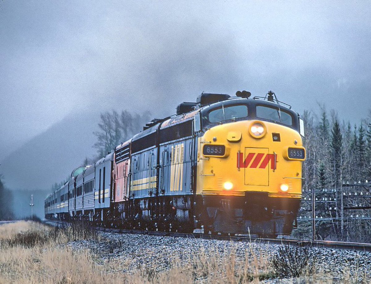 VIA 6553 with the Canadian at the Old Yale Road crossing, just east of Rosedale, BC on the Yale Sub. in May 1982

Roger Puta Collection
Description by Marty Bernard
Public Domain 🇺🇸