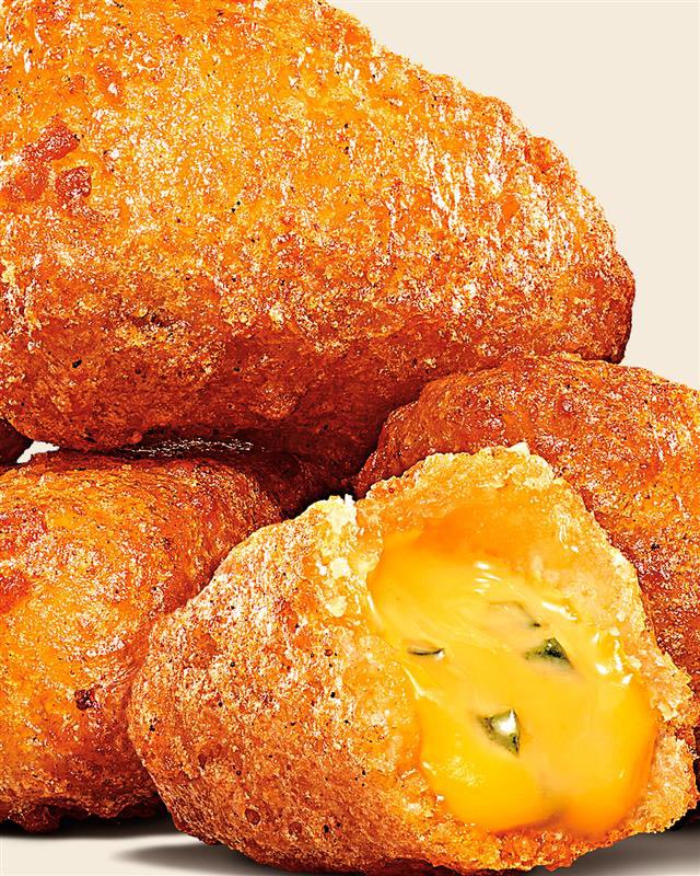 Cuando sonríes al comerte una Chili Cheese Bite, y ella te sonríe de vuelta: