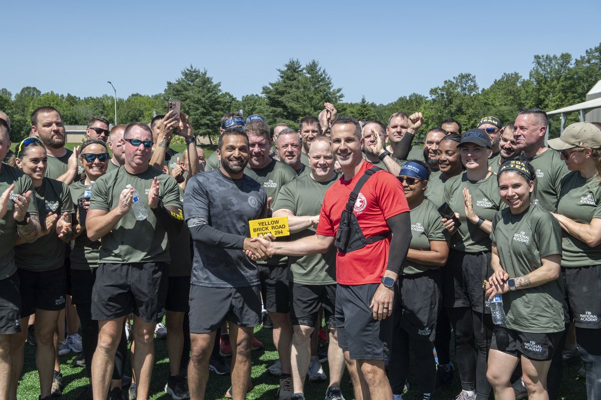 FBIDirectorKash's tweet photo. When our new @FBI National Academy participants graduate this is their final fitness test… the “Yellow Brick Road.” 6.1 mile run on an obstacle-course style trail built by the U.S. Marines. Got the chance to run it yesterday with our latest class, NA294 graduating this week. Congratulations to the new grads.