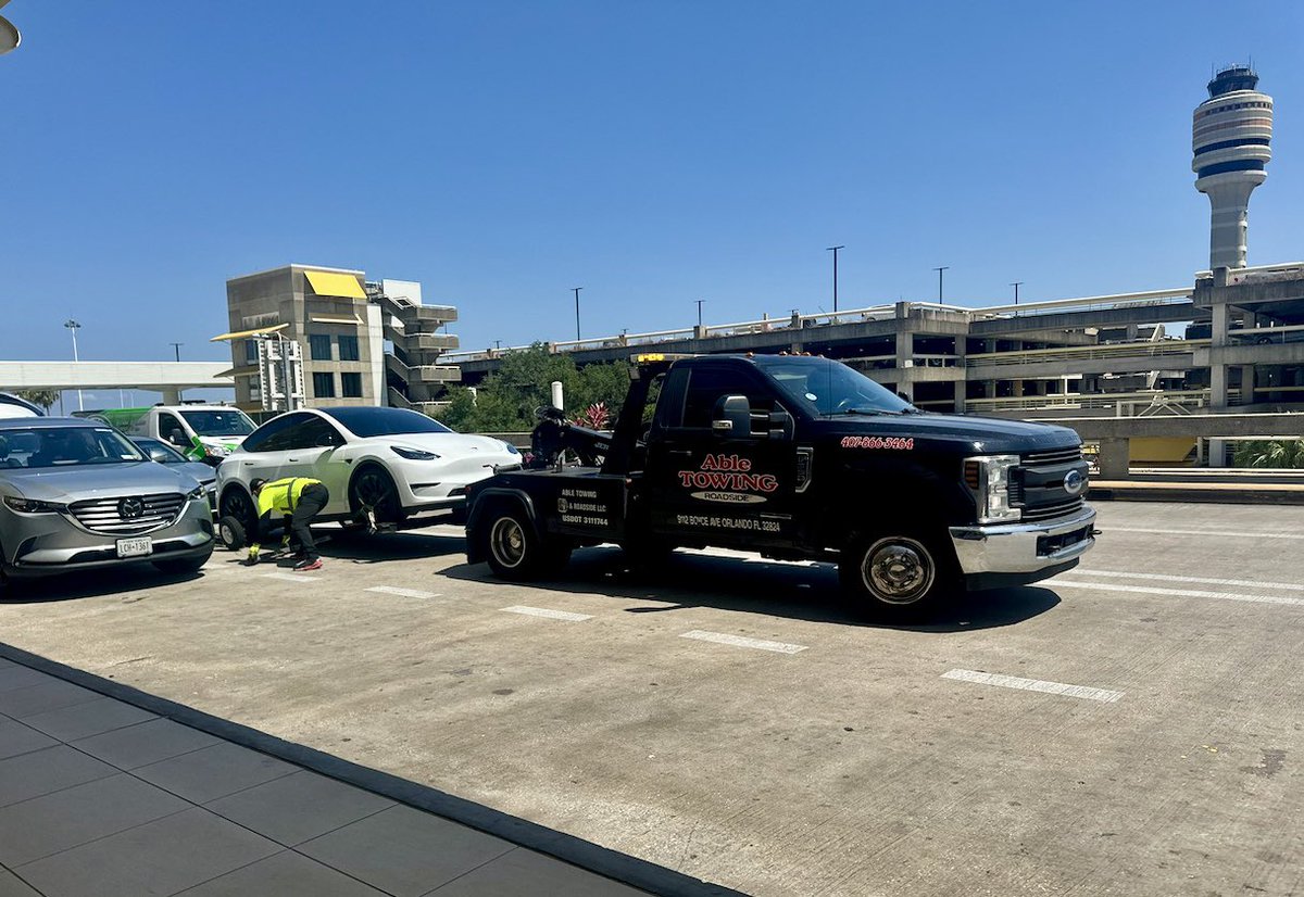 AbleTows's tweet photo. Towing a Tesla Model Y at the Orlando Airport 💪 We are the exclusive towing provider for the Orlando Airport - 24/7 Towing - Roadside - and Transport Able Towing 407-866-3464 #AirportTowing #AbleTowing #OrlandoTowing #OrlandoRoadside #RoadsideAssistance #TowLife #TowTruck https://t.co/SH7IxaywFJ