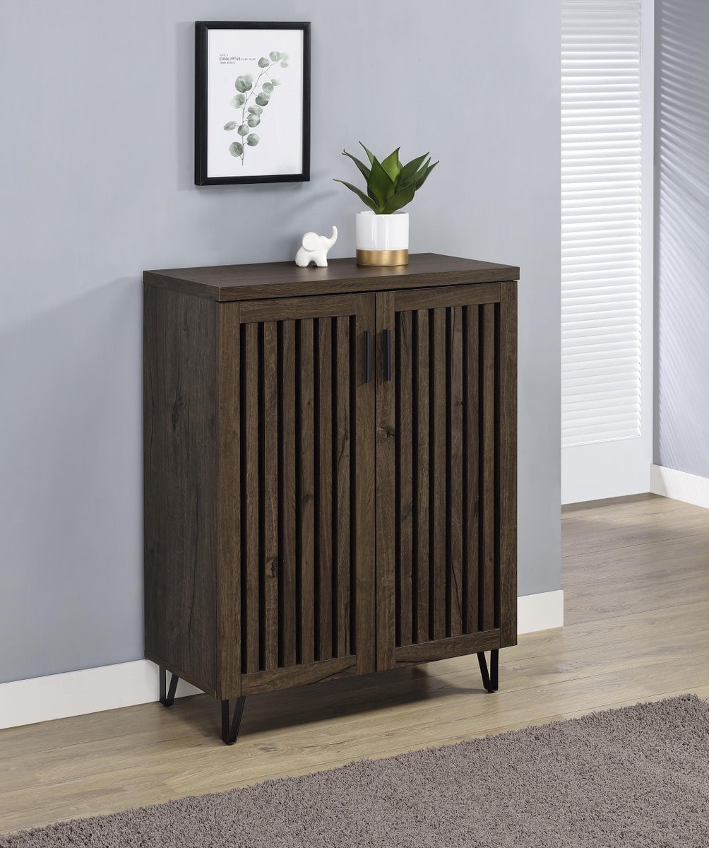 Step up your entryway game 👟 This sleek shoe cabinet keeps clutter hidden and style front and center. #EntrywayGoals #SmartStorage #ModernLiving

Item # 950423

Use the store locator to find a Coaster dealer near you. ✨ Link in bio!