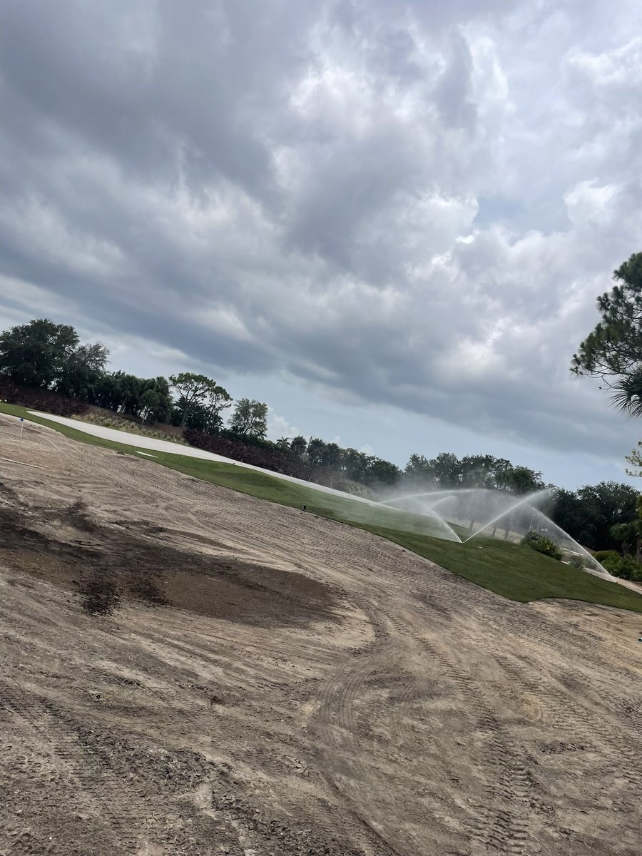Always good seeing water flying! Hole 11 green, Naples Grande Golf Club