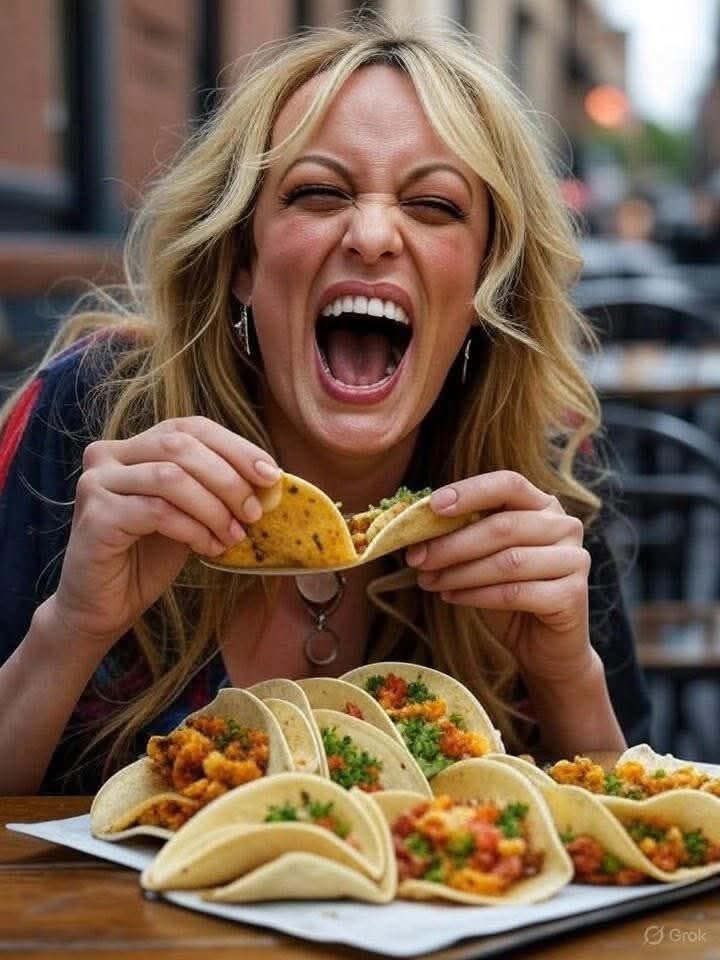 Stormy eating “mini” tacos to celebrate #TACOTrump Tuesday.