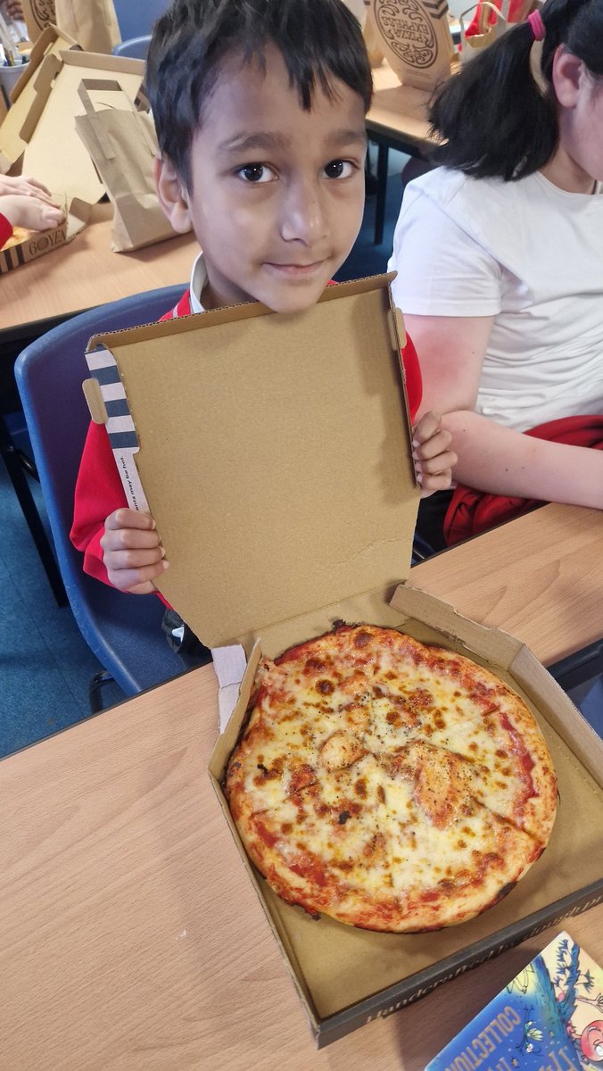 When we got back to school, we couldn't resist tasting a slice of our pizzas! They were delicious and perfect to fuel us for swimming later! The rest of the pizzas are coming home today!