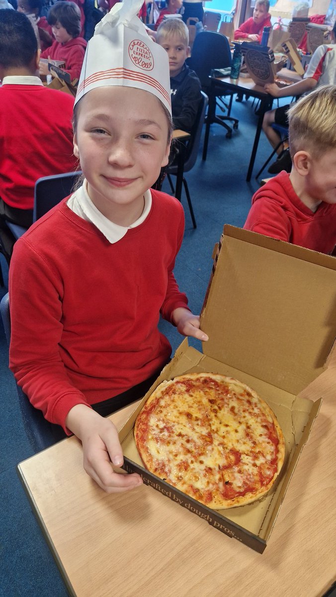 When we got back to school, we couldn't resist tasting a slice of our pizzas! They were delicious and perfect to fuel us for swimming later! The rest of the pizzas are coming home today!