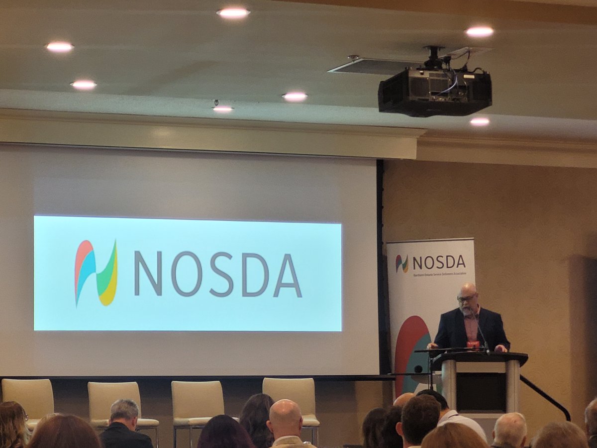 NOSDA2's tweet image. Attendees were welcomed by Stephanie Pagnucco, Chair of the District of Sault Ste. Marie DSSAB; Norman Mann, Chair of the Algoma DSSAB; and Sault Ste. Marie Mayor Matthew Shoemaker. A video message was also shared from Michael Parsa, Minister of MCCSS