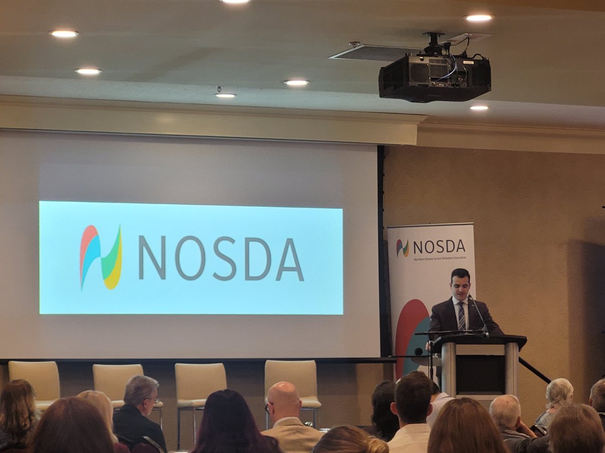 NOSDA2's tweet image. Attendees were welcomed by Stephanie Pagnucco, Chair of the District of Sault Ste. Marie DSSAB; Norman Mann, Chair of the Algoma DSSAB; and Sault Ste. Marie Mayor Matthew Shoemaker. A video message was also shared from Michael Parsa, Minister of MCCSS