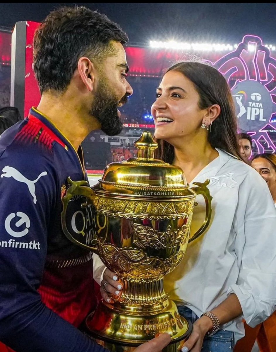 In a world so loud, his gaze is still
Focused on her, his heart’s true will
Through every cheer, her smile brings calm,
Their love, the real victory, strong and warm

The crowd fades, his world is still anchored by her smile. Virat &amp; Anushka’s bond is the true win 

#PowerCouple