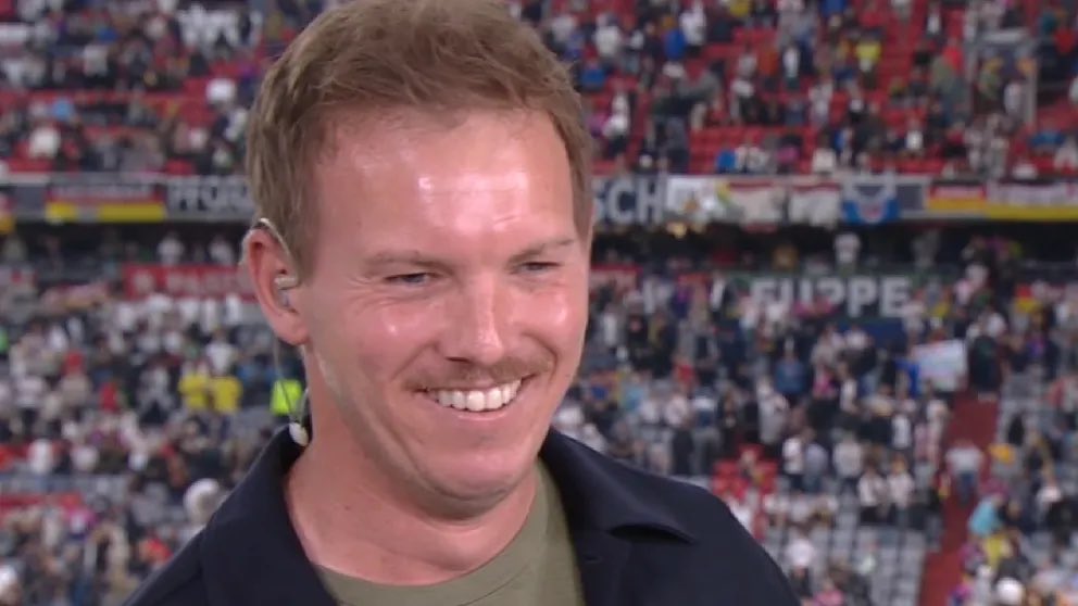 KI_limero's tweet photo. Nagelsmann mit Oliba wie 80er DDR Pornostar. #NationsLeague #GERPOR #Nagelsmann #oliba https://t.co/GtkUPptvNu