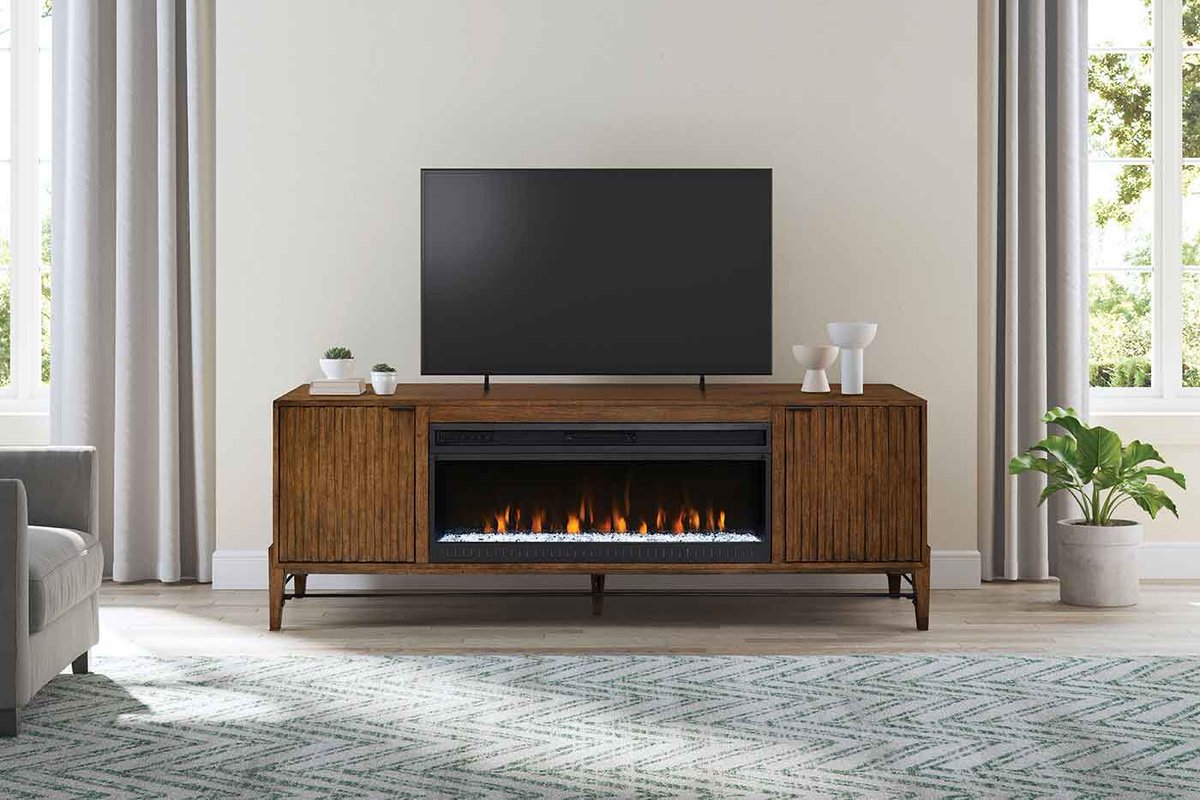 Elevate your living space with the bold sophistication of the #Delray #FireplaceConsole. At 82 inches wide, this statement piece blends mid-century modern elegance with contemporary functionality. 
#martinfurniture
#lifestylefurniture
#entertainmentfurniture
#freshdesigns