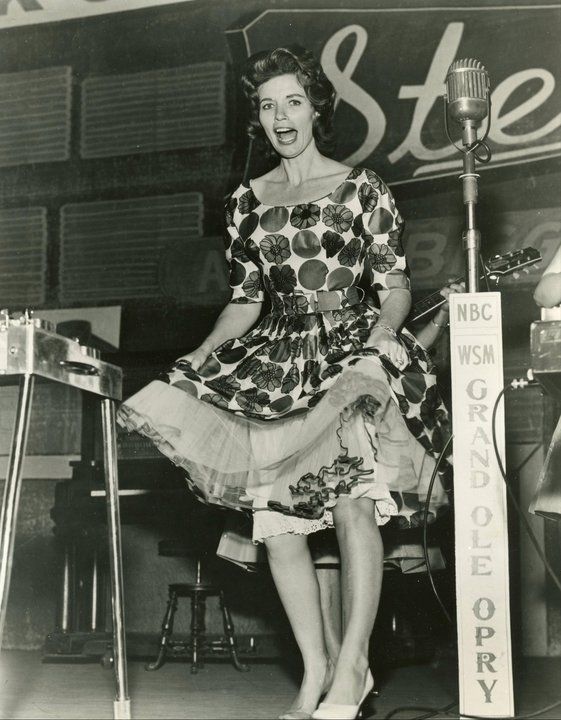 A glimpse of June Carter Cash’s performance at the Grand Ole Opry, marking 75 years since she joined the legendary Carter Family on that stage.