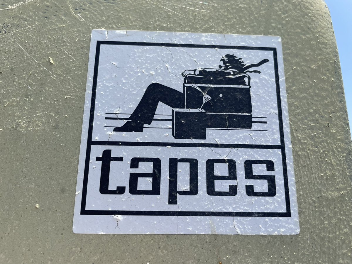 DeanCSmith's tweet photo. @MaxellCorp Random Tag on the street sign #TAPES 😎 https://t.co/KGwiXDwtoV