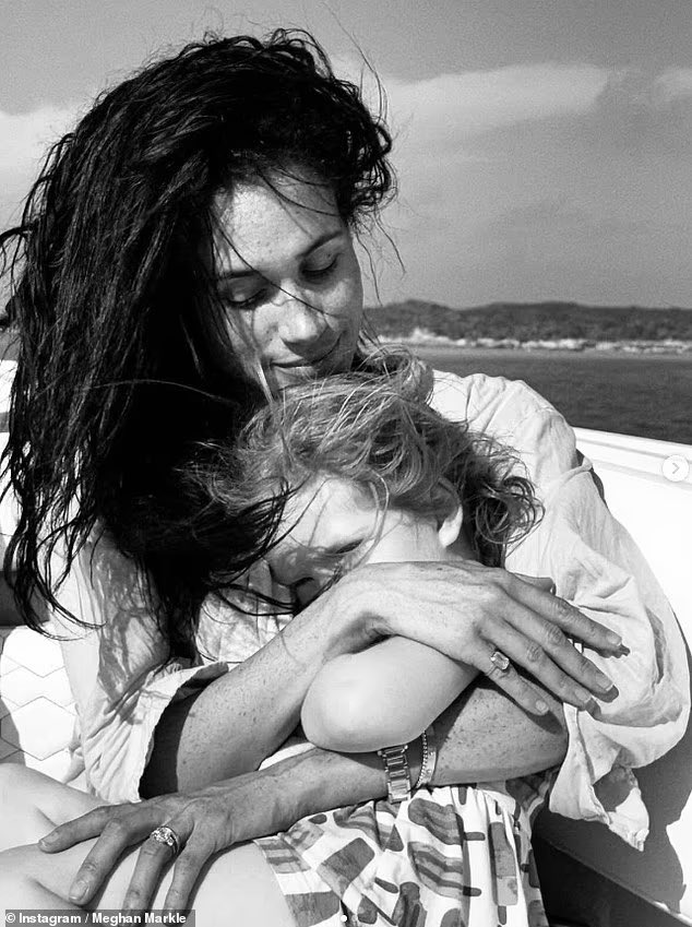 Meghan’s doing a slow strip tease with her children’s faces.

This image with Lili folded up in her arms and peeking seductively at the camera through her hair, Meghan’s own hair teased and plastered with product like they’re in a Calvin Klein commercial is beyond repulsive. 

So