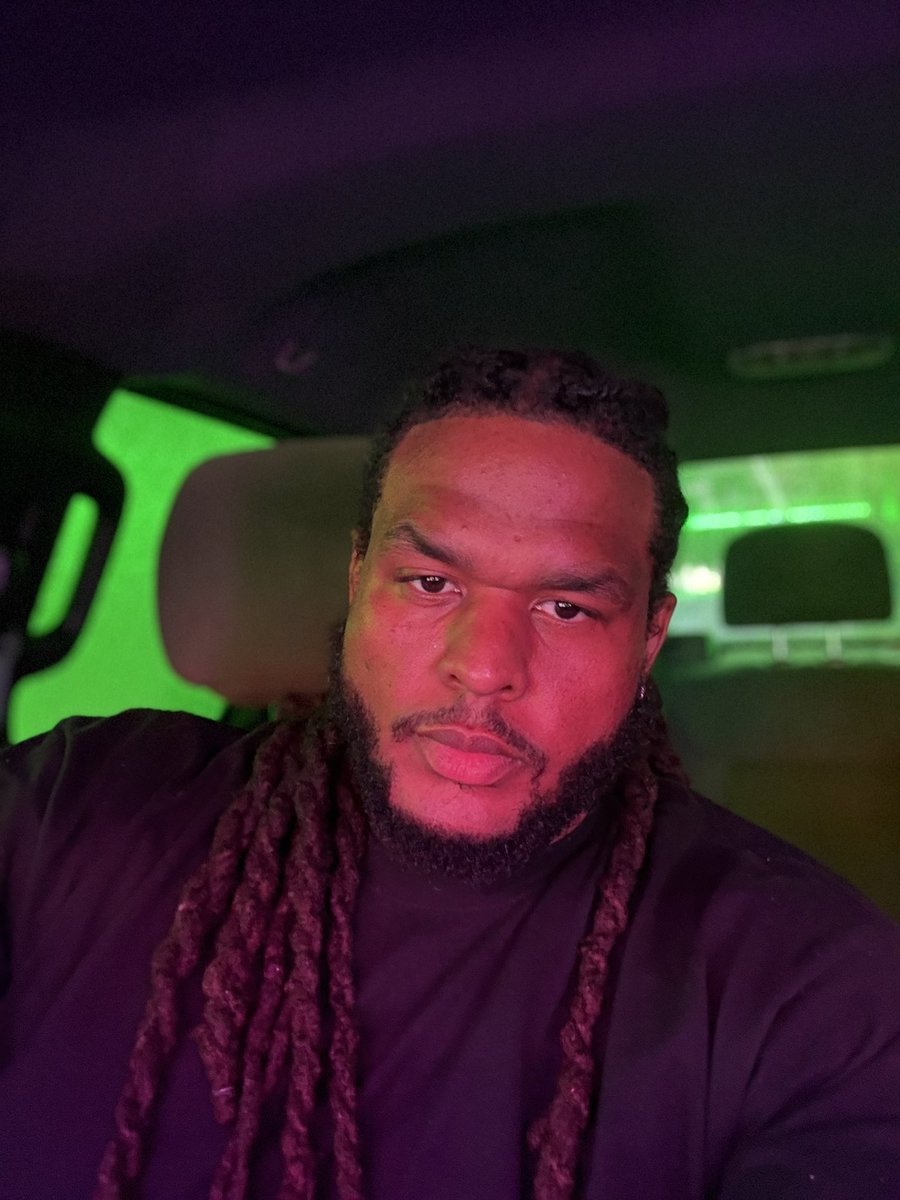 QT with a car selfie