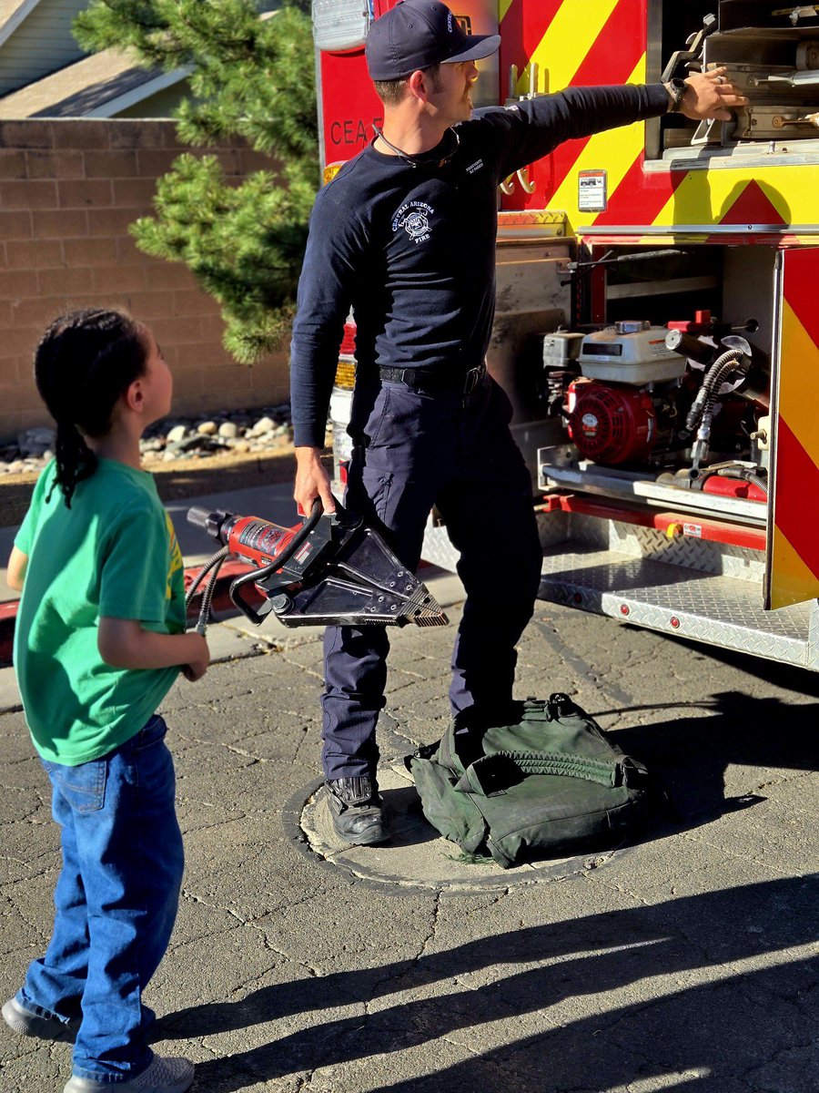 The other day, Engine 61 was out in the community when a dad and his son asked if they could check out the engine. #Firefighter Parker walked them through it with genuine excitement, like he was showing it to his own child. Thanks for stopping by, you made our day! #AZFire