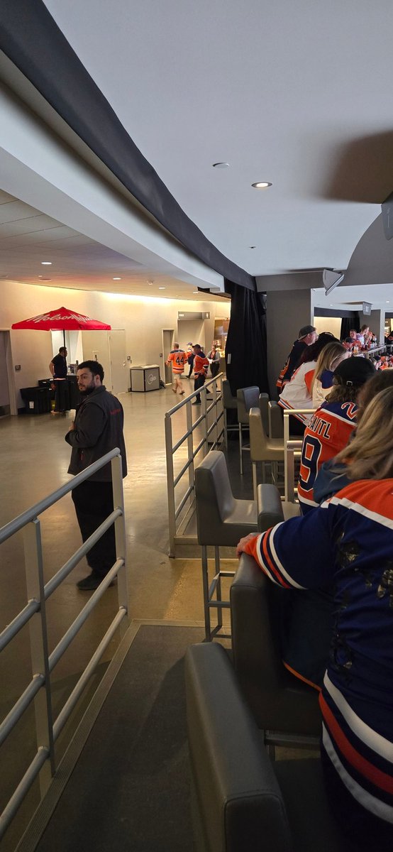 OlsenNeil's tweet photo. The upper drinkrail in Rogers has curtains behind them that are closed for "climate control".  First time in 8 years the "NHL wants them open".  Bullshit... the cold air is off the ice, it's more like the swamp that Florida is used to playing in. Our boys have not adjusted yet. https://t.co/gxsIHI6bhD