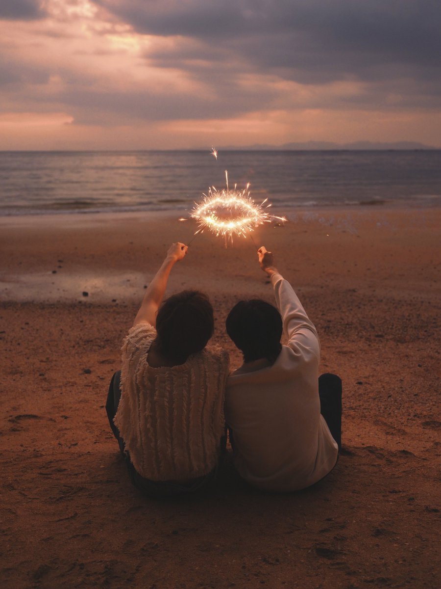 Your teeth left whispers on my palm—: a love story half-told, half-lost.
The tide may steal the shore’s rough edges,but never this secret etched into my skin.
Will you dream of us, years from now? Of salt-kissed winds and endless blue, of two souls running from a summer that
