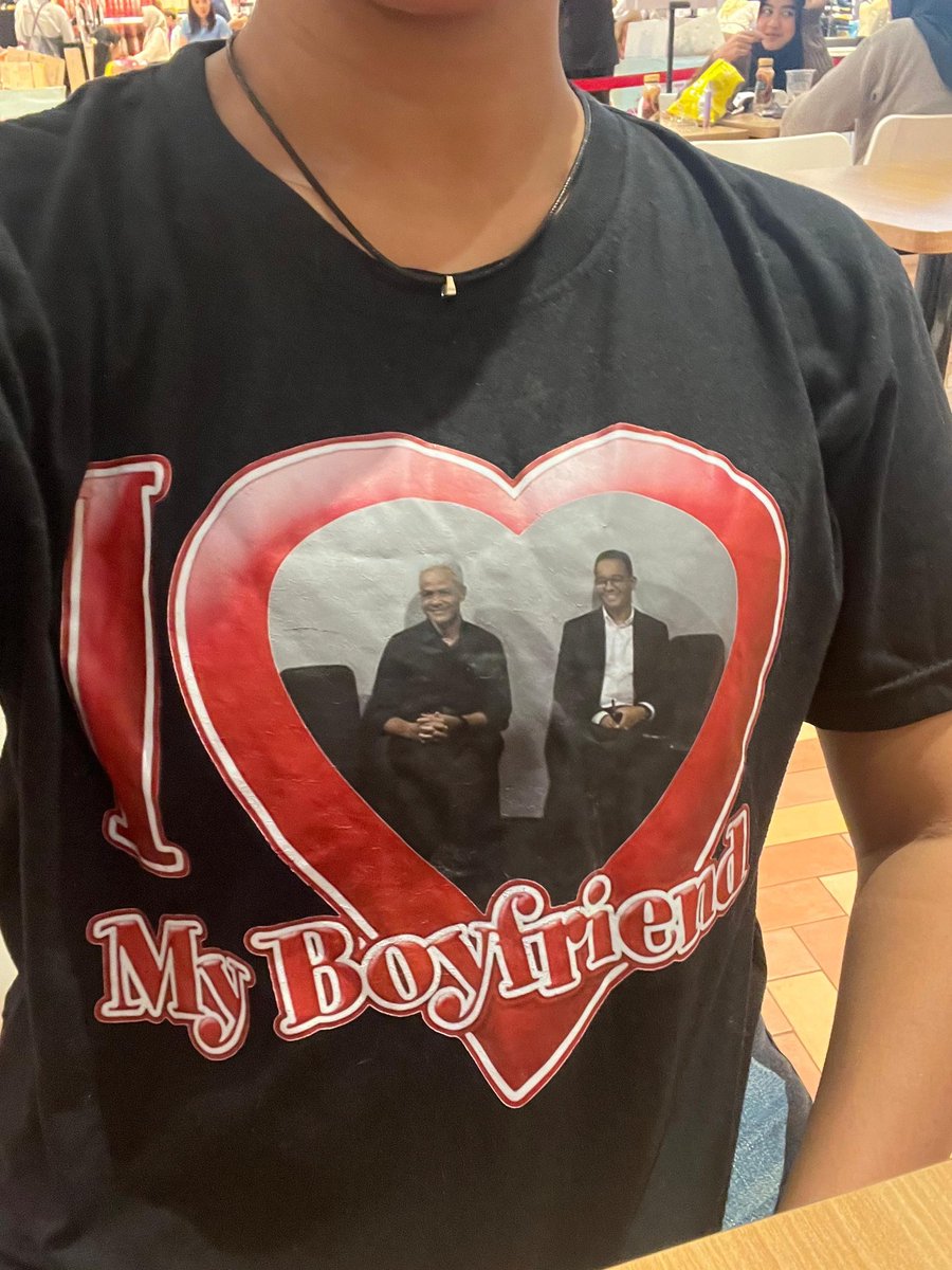 juneg's tweet image. me and ganies tshirt against the world