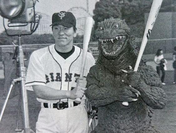 “Two Godzillas? What does it mean?!”

Baseball icon Hideki “Godzilla” Matsui poses with the real deal.