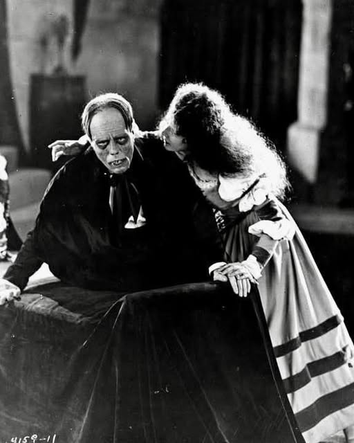 Lon Chaney and Mary Philbin in a production still for the 1925 silent film THE PHANTOM OF THE OPERA