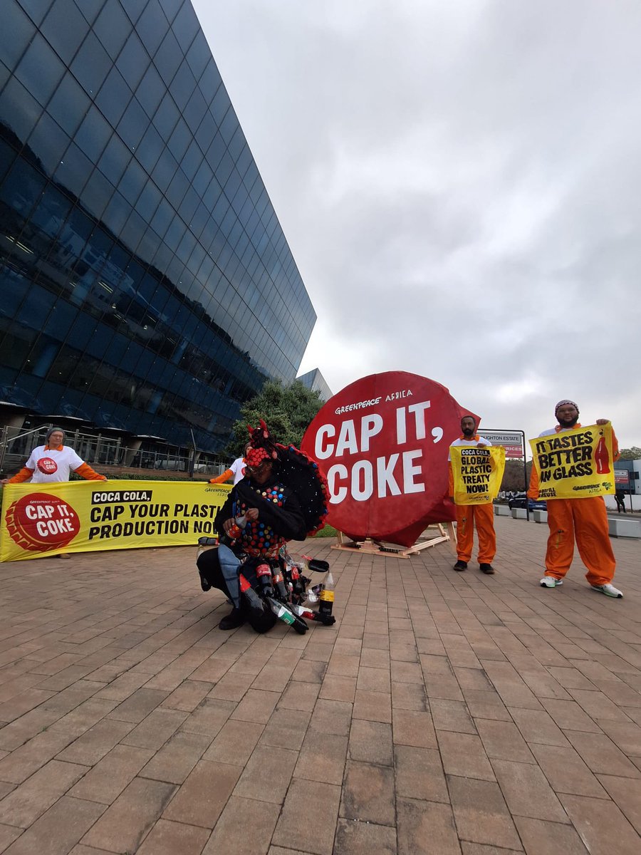 HellenDena's tweet photo. Coca-Cola is the number 1 plastic polluter globally producing 120 billion throwaway plastic bottles a year, that is why @Greenpeaceafric activists staged a protest outside their corporate offices in Johannesburg #BeatPlasticPollution #WorldEnvironmentDay2025 https://t.co/AaT3TFua3D