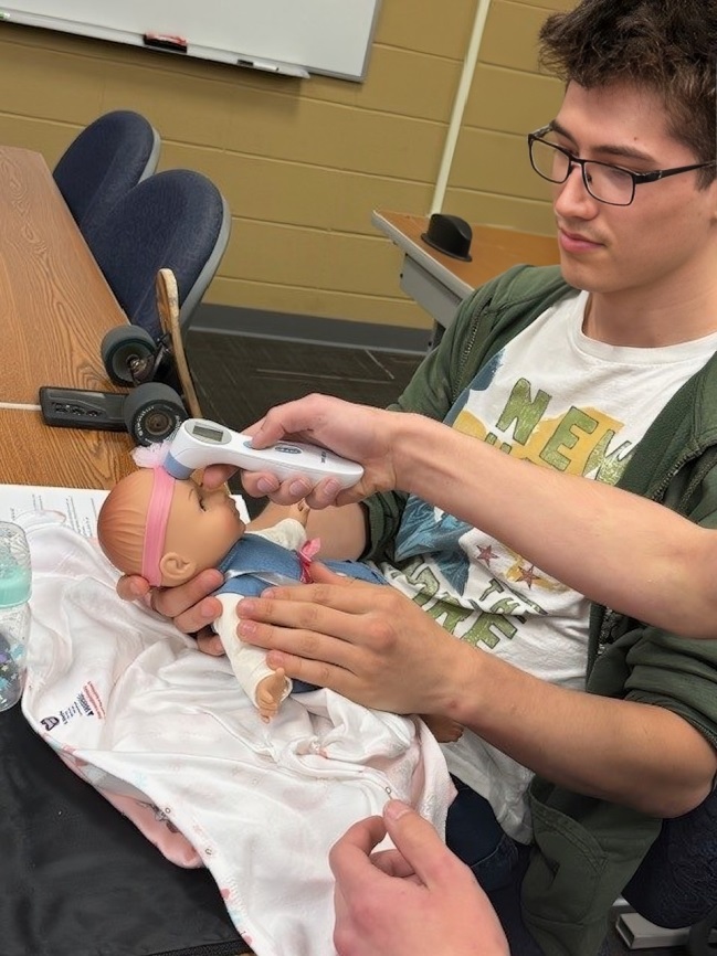 Last semester nursing faculty held a childcare class for @sigepwichitastate! 👶🍼 Fraternity members practiced infant care skills like swaddling, feeding, diapering &amp; more using newborn-size manikins. Part of SigEp’s “Challenge Class” series for real-life skills after college!