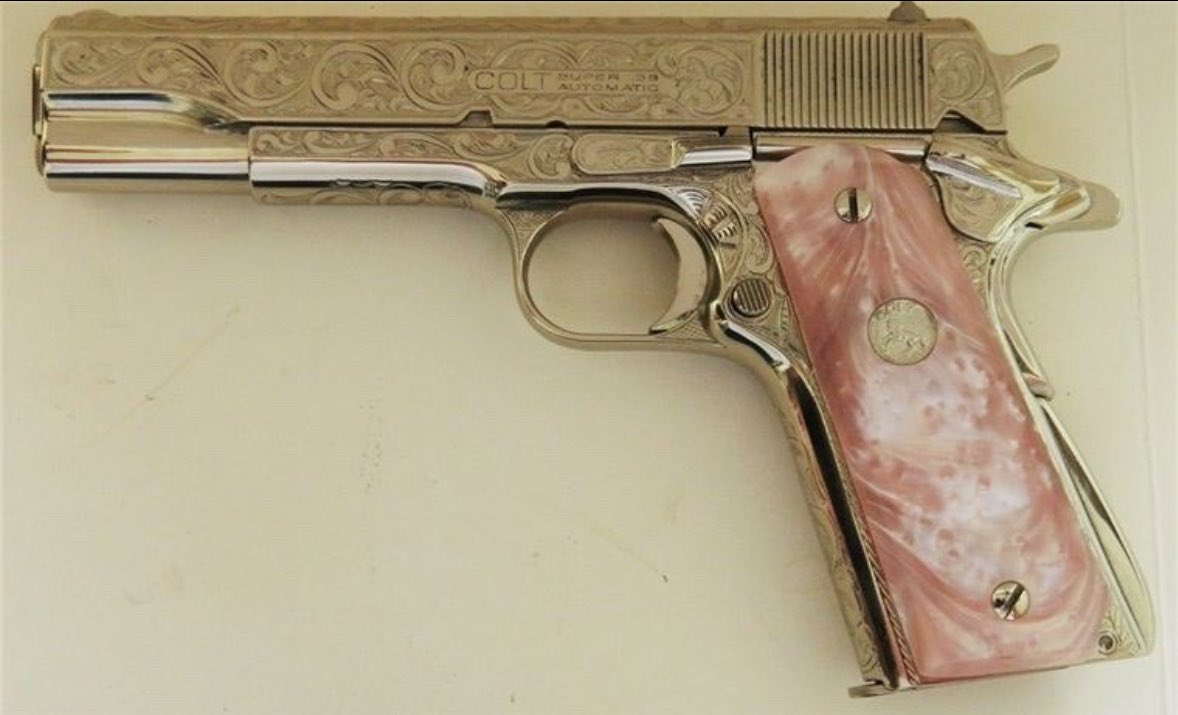Colt 1911, chambered in .38 Super