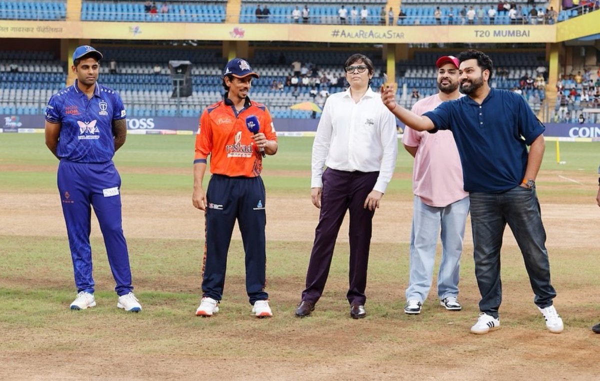 rohittv_45's tweet photo. A special sight in Mumbai T20 League — Rohit Sharma for toss 💙!! https://t.co/fDItfLFbBl