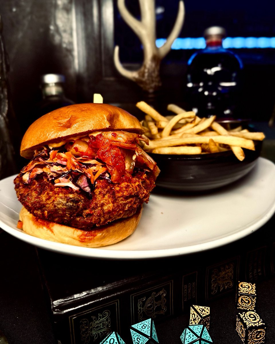 Our lawyers say it's totally different 😉🍔 
Meet our new K.F.C. (Korean Fried Chicken) Sandwich, a staff fave with gochugaru-spiced fried chicken, kimchi, coleslaw, vegan sriracha aioli, and a brioche bun you’ll dream about. 
Comes with a side and zero copyright infringement 🍟