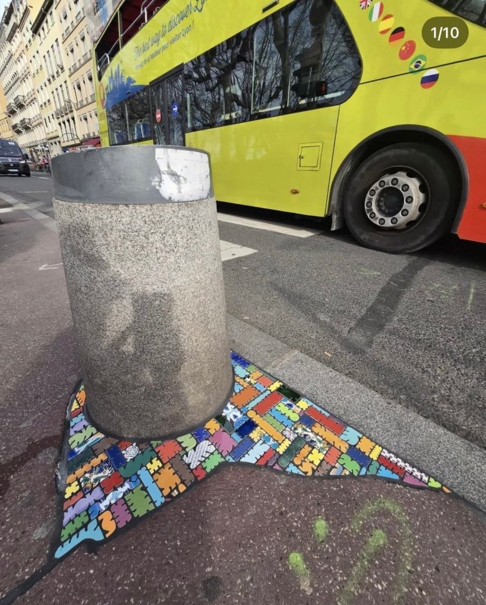 French Artist “EmEmEm”paves cracks and holes with mosaics. This is also known as “Flacking”.
