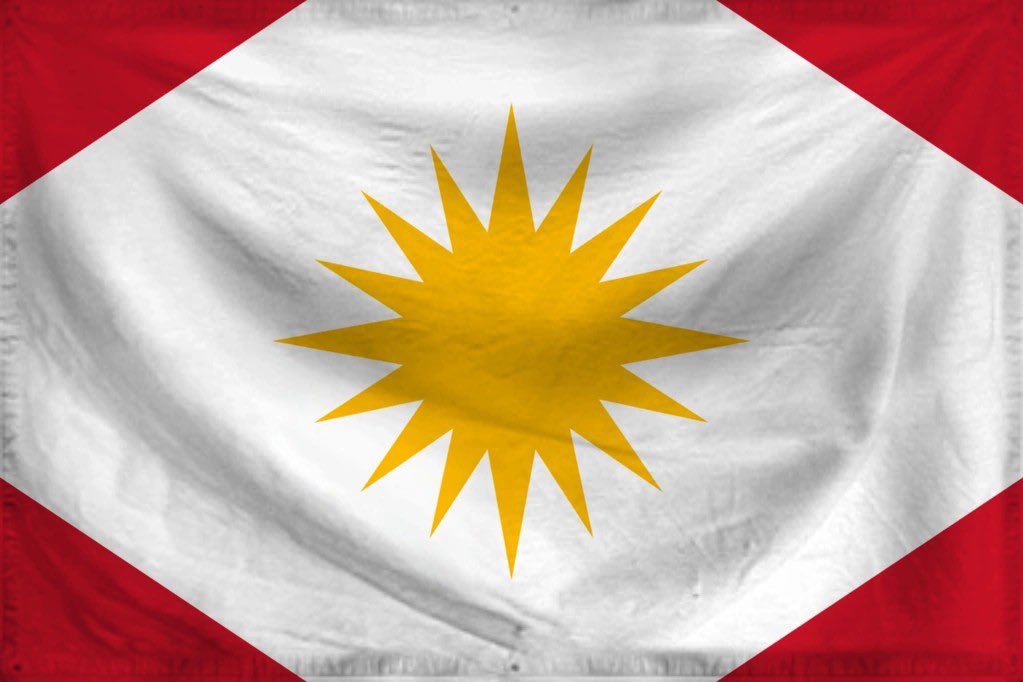 Bu bizim Alevi bayrağımızdır. 1920’lerde Fransız mandası altındayken sahildeki Arap Alevilerin bağımsızlık ve birlik sembolü olarak oluşturuldu. 

16 güneş ışınının 12’si on iki imamları temsil ederken, yönlere doğru olan diğer 4 büyük ışın tüm Alevilerin dünya üzerinde