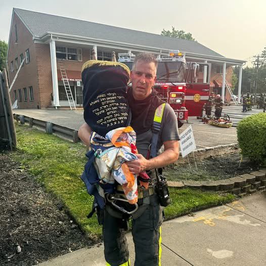 A raging fire tore through a building on Northern Boulevard in Greenvale, Long Island
Firefighter Michael Farca made his way into the basement. Amid the smoke and destruction, he recognized something sacred: a small section belonging to the Chabad of Greenvale. “I saw the ark—the